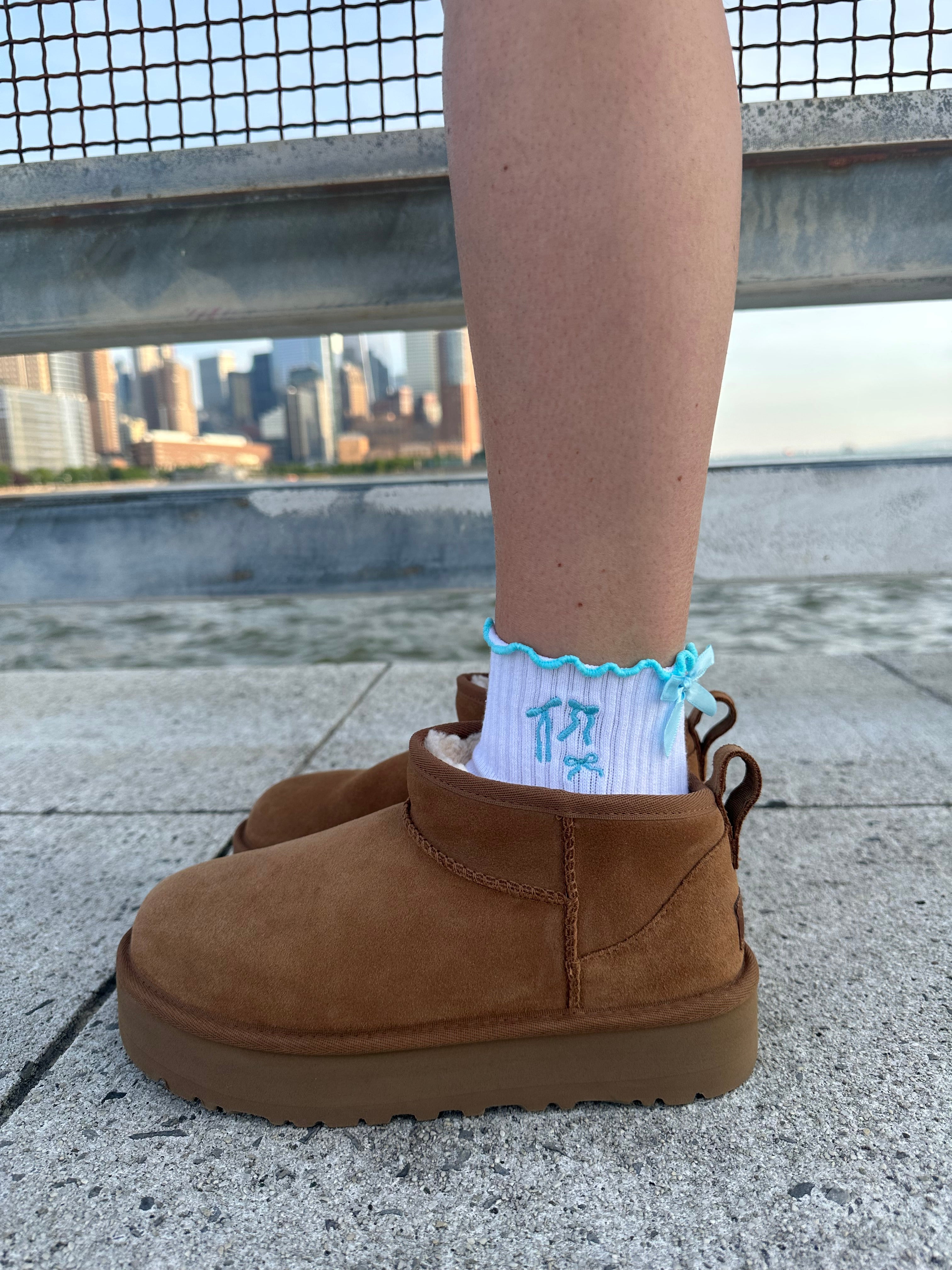 Blue bow grip socks