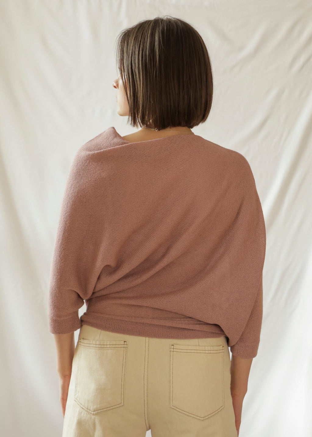 Paya Alpaca Sweater — handcrafted asymmetric alpaca knit, lightweight and minimalist design from Bolivia.