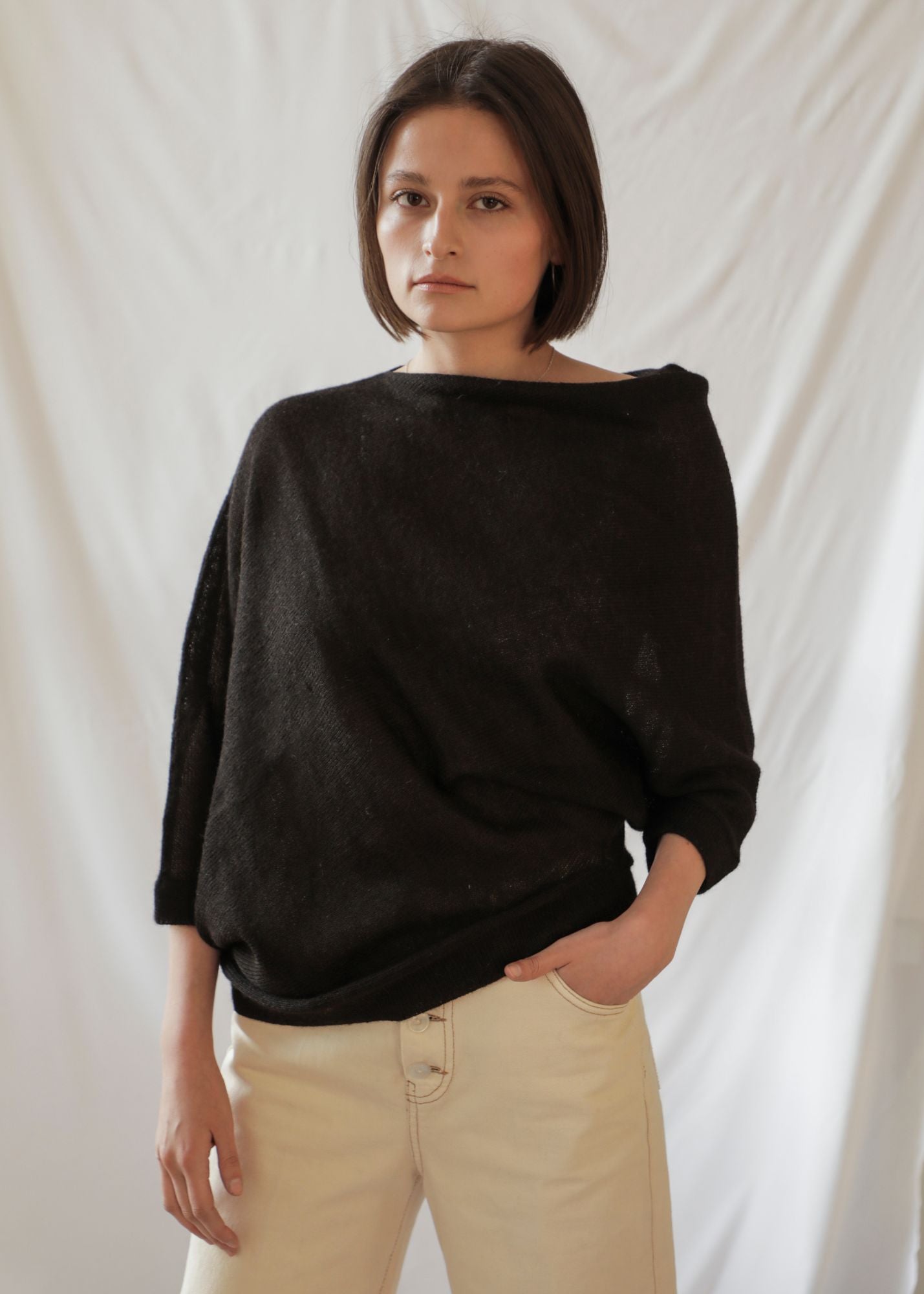 Paya Alpaca Sweater — handcrafted asymmetric alpaca knit, lightweight and minimalist design from Bolivia.