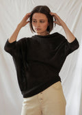 Paya Alpaca Sweater — handcrafted asymmetric alpaca knit, lightweight and minimalist design from Bolivia.