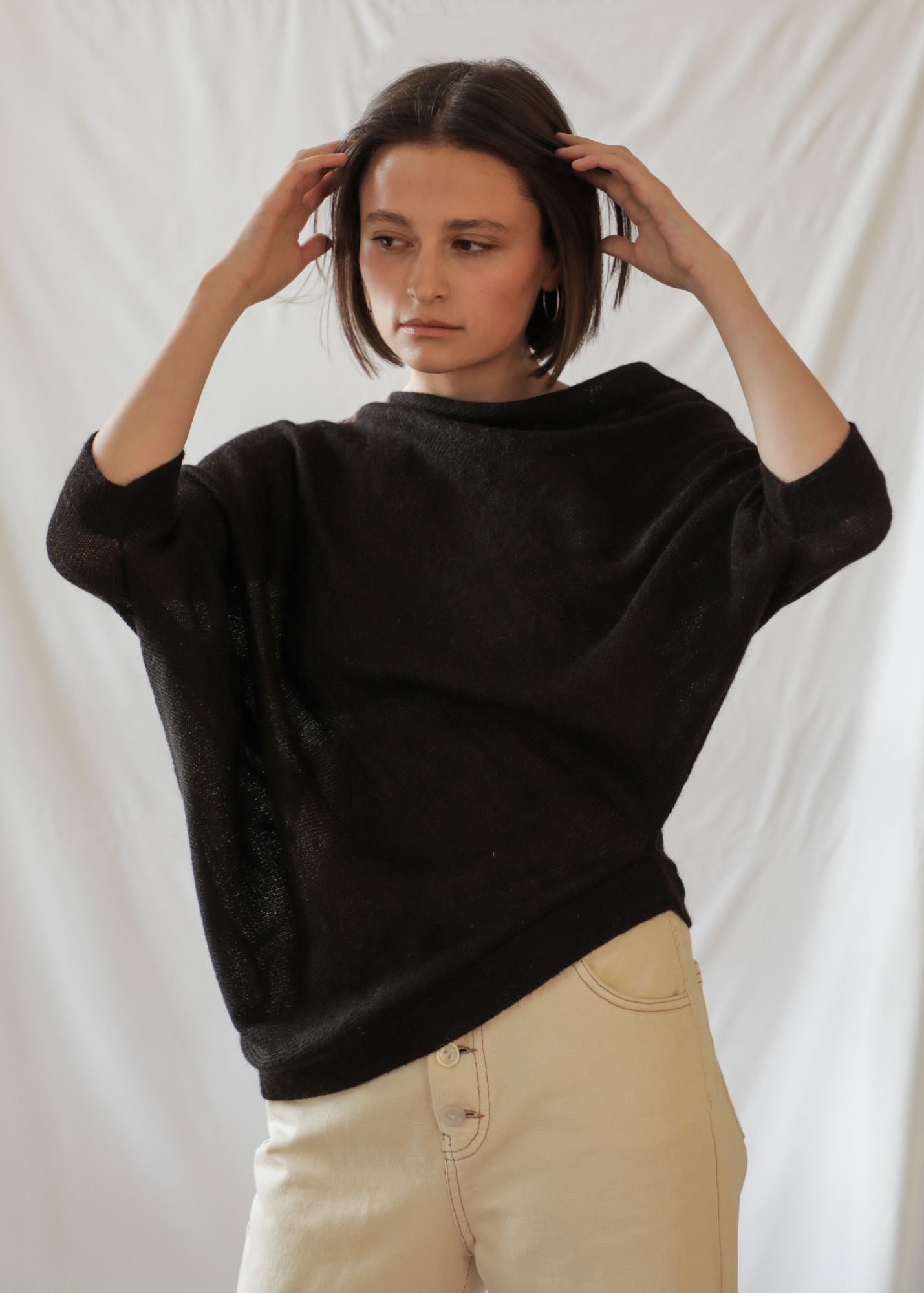 Paya Alpaca Sweater — handcrafted asymmetric alpaca knit, lightweight and minimalist design from Bolivia.