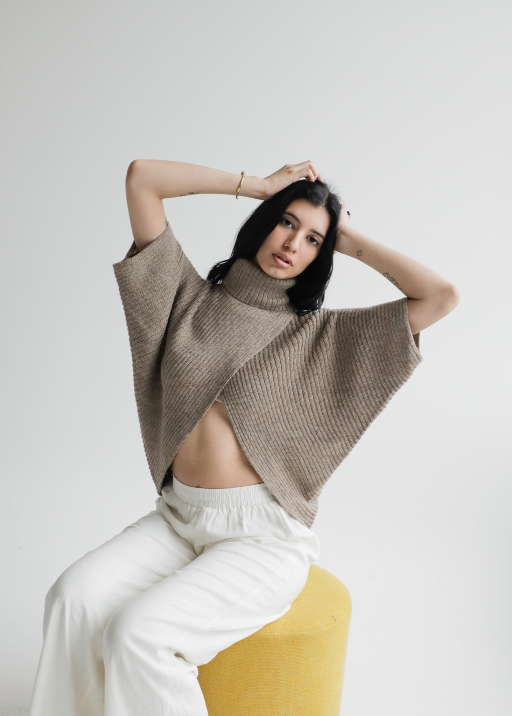 Kukuri Alpaca Poncho — timeless alpaca sweater-poncho with soft drape, handmade in Bolivia.