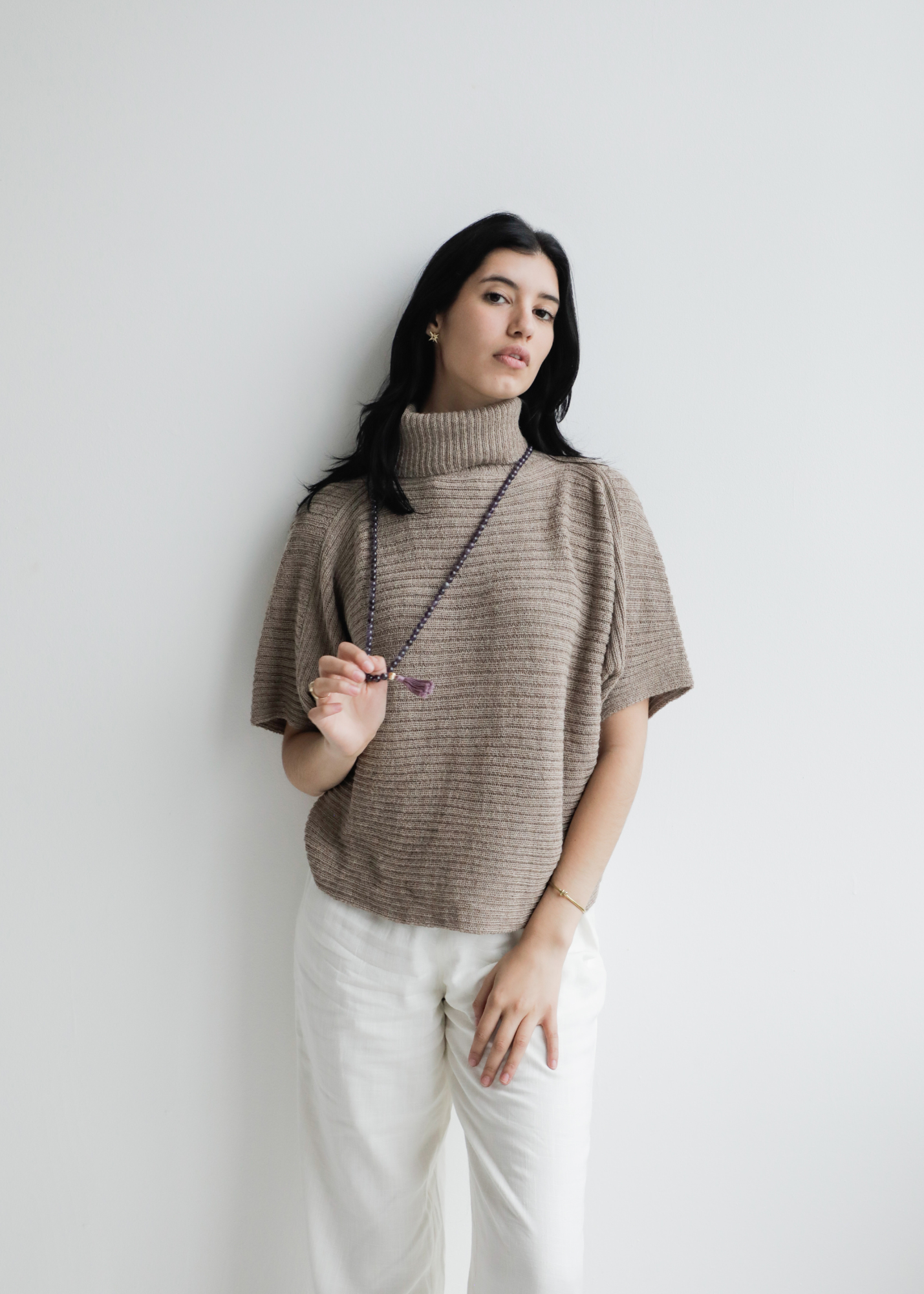 Kukuri Alpaca Poncho — timeless alpaca sweater-poncho with soft drape, handmade in Bolivia.