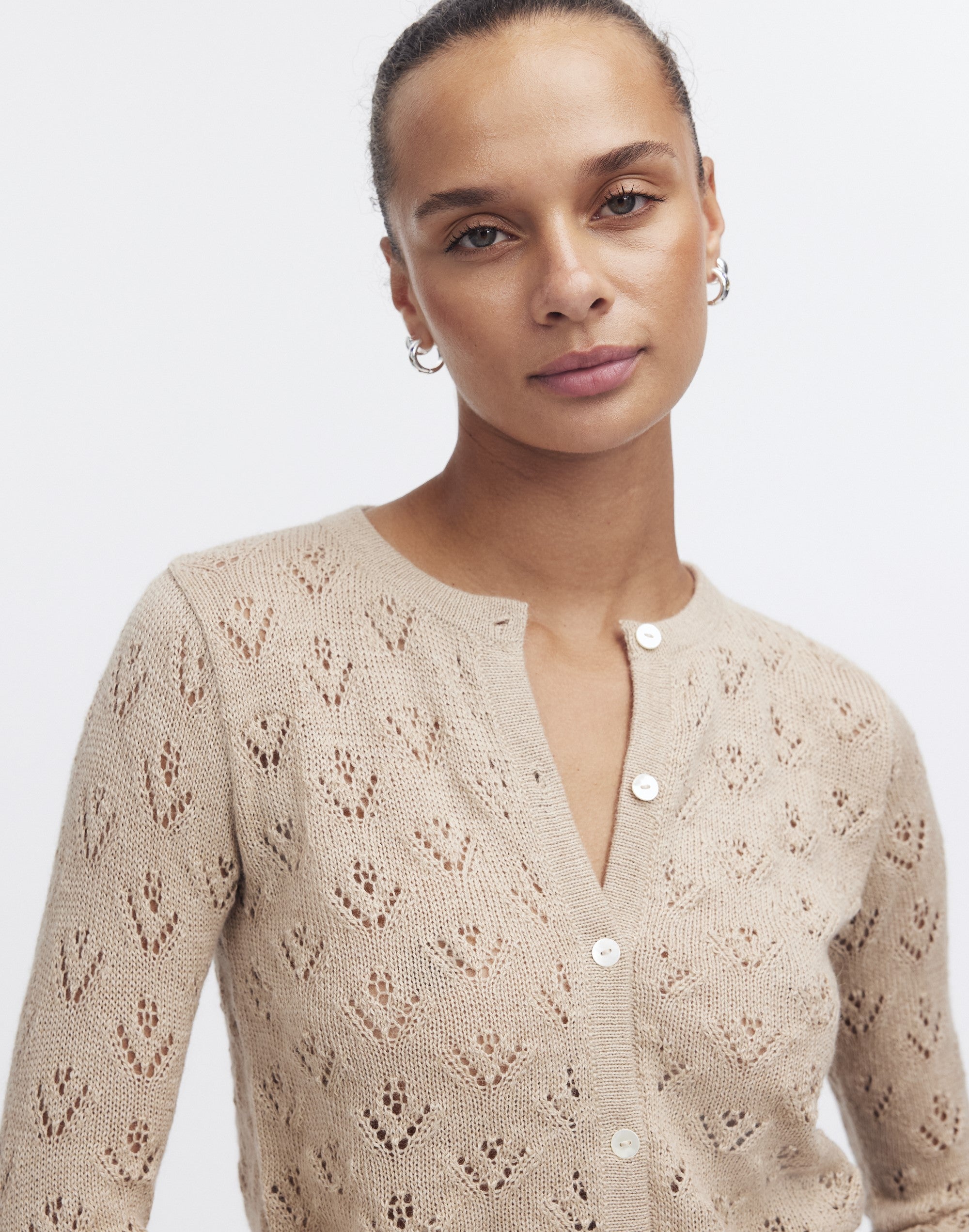 Qupana Alpaca Cardigan — cropped baby alpaca cardigan with delicate lace stitch, lightweight and handmade in Bolivia.