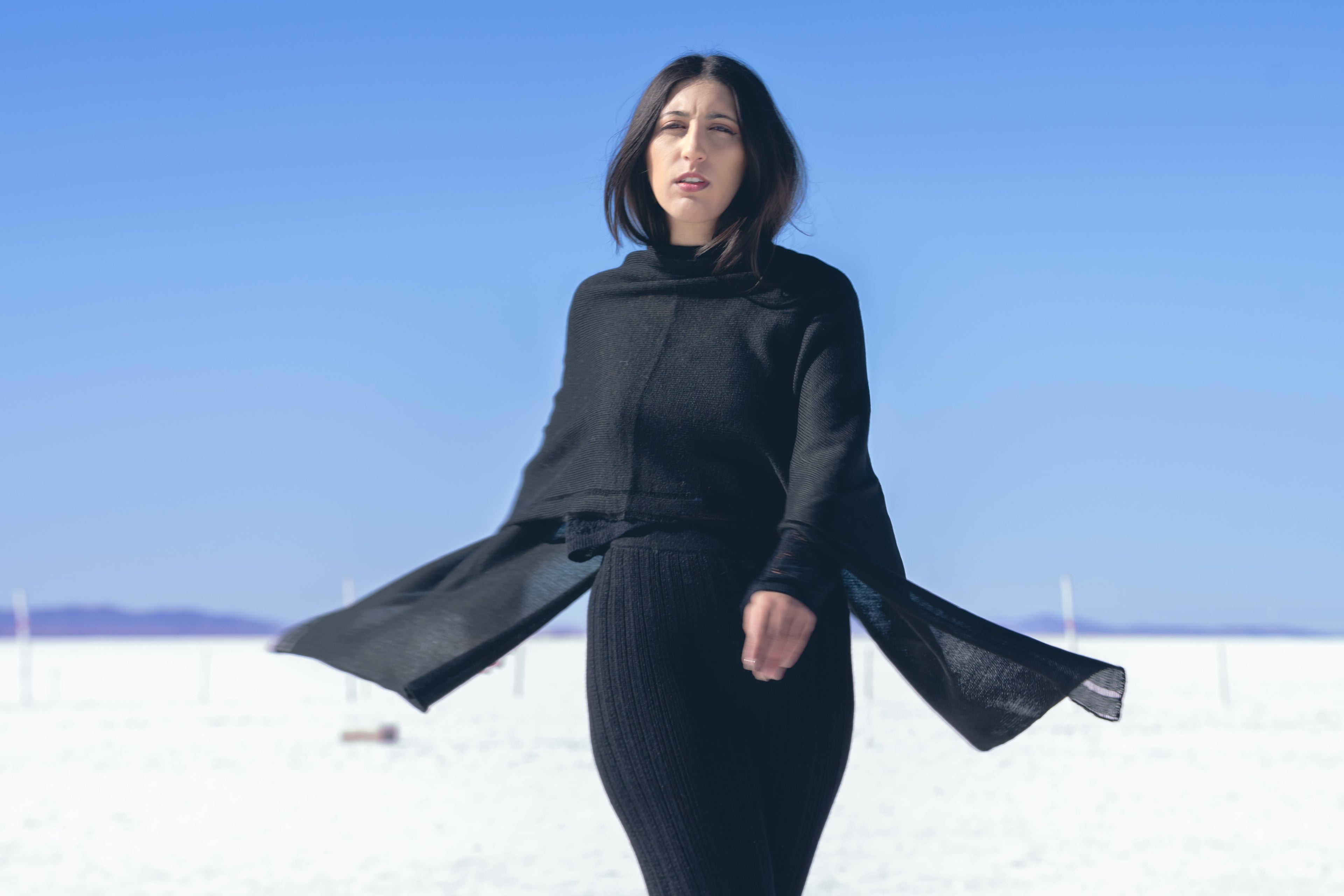 Sisa Alpaca Poncho — handwoven alpaca poncho with elegant drape and timeless silhouette, artisan-made in Bolivia.