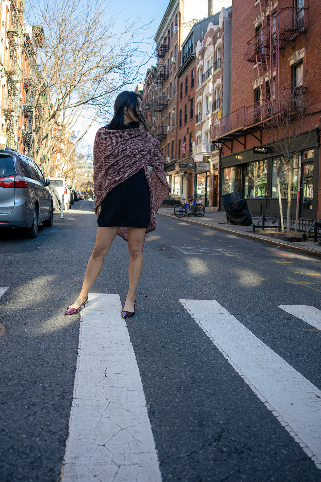 Chama Alpaca Poncho — alpaca poncho with relaxed silhouette, handmade in Bolivia, inspired by Aymara word for “strong and positive energy.”