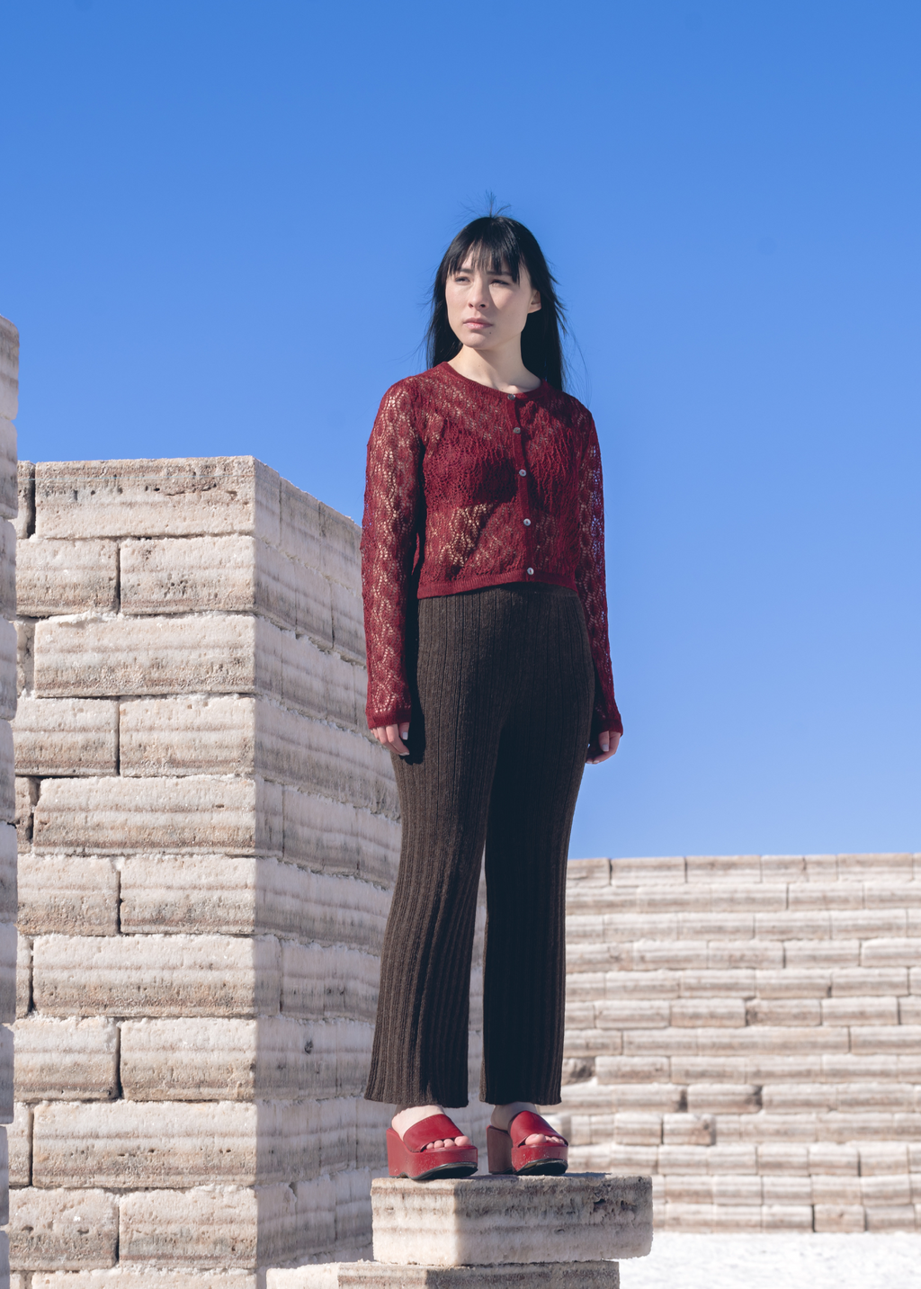 Wara Crop Alpaca Cardigan — cropped alpaca cardigan with artisanal finish, handmade in Bolivia, inspired by the Aymara word for “star.”